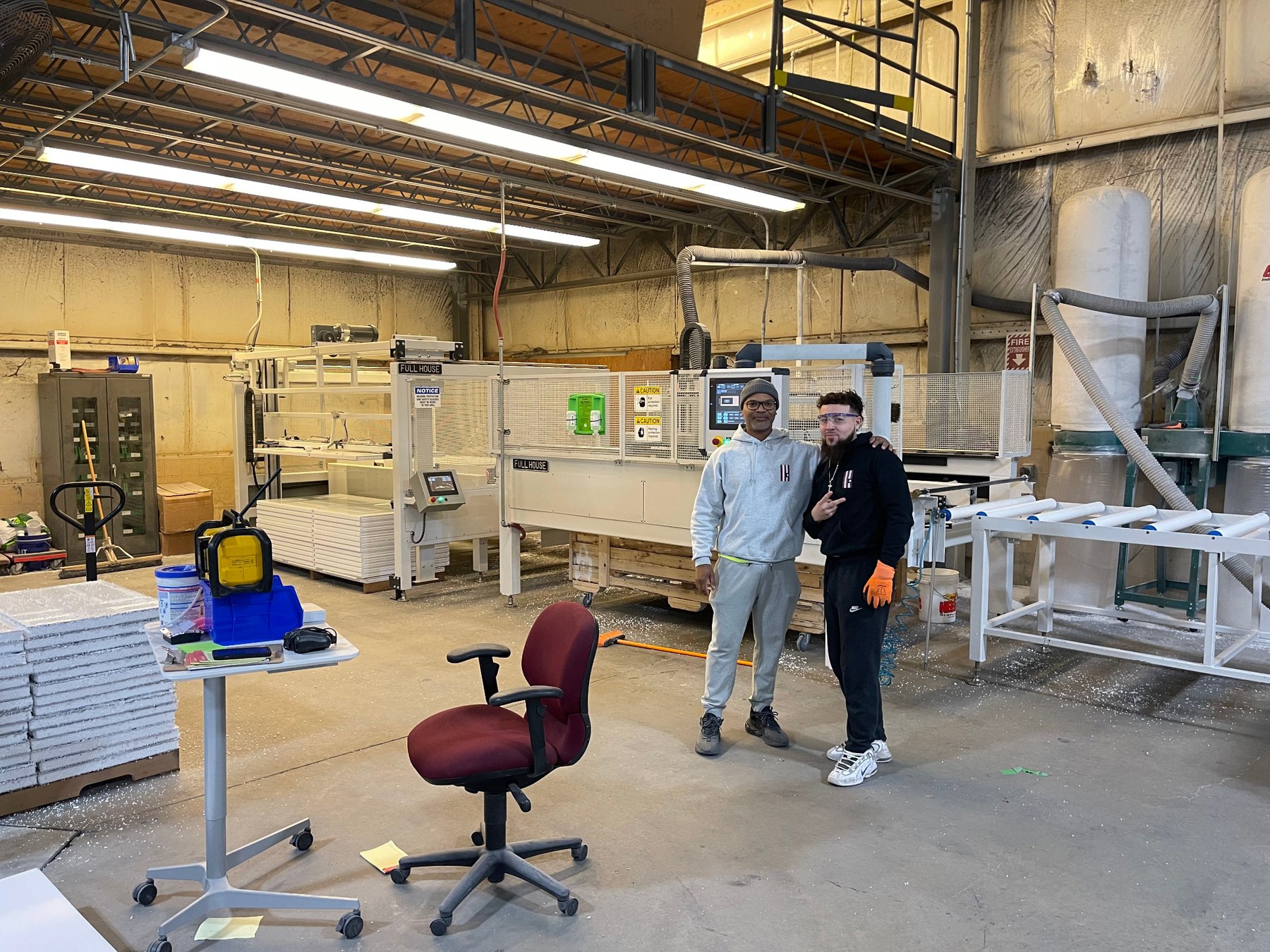 American Door team members on the production floor